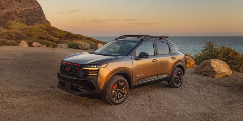 2027 Nissan Kicks SUV exterior view by coastline
